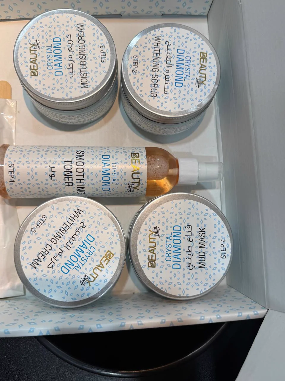 Numbered step-by-step jars and toner bottle of Beauty Palm Diamond Facial