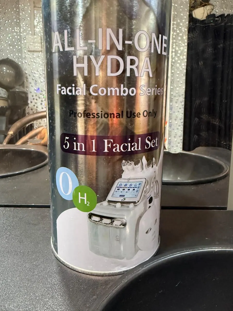 Hydra facial 7-in-1 treatment device in use at the salon